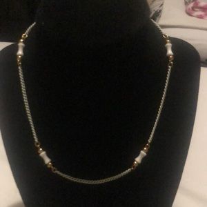 Gold and white necklace